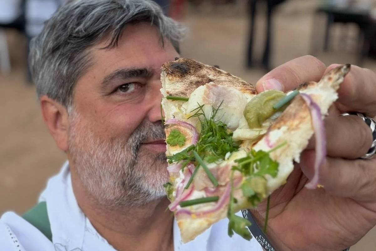 Uma fatia da pizza com enguia, criação da pizzaria Lupita para o Chefs on Fire 2026